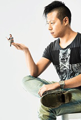 man sitting on stool
