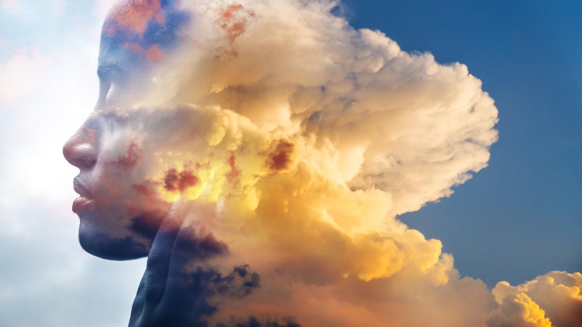 Image of face in clouds