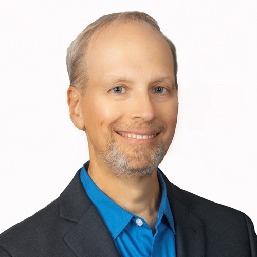 A headshot of Dr Brown