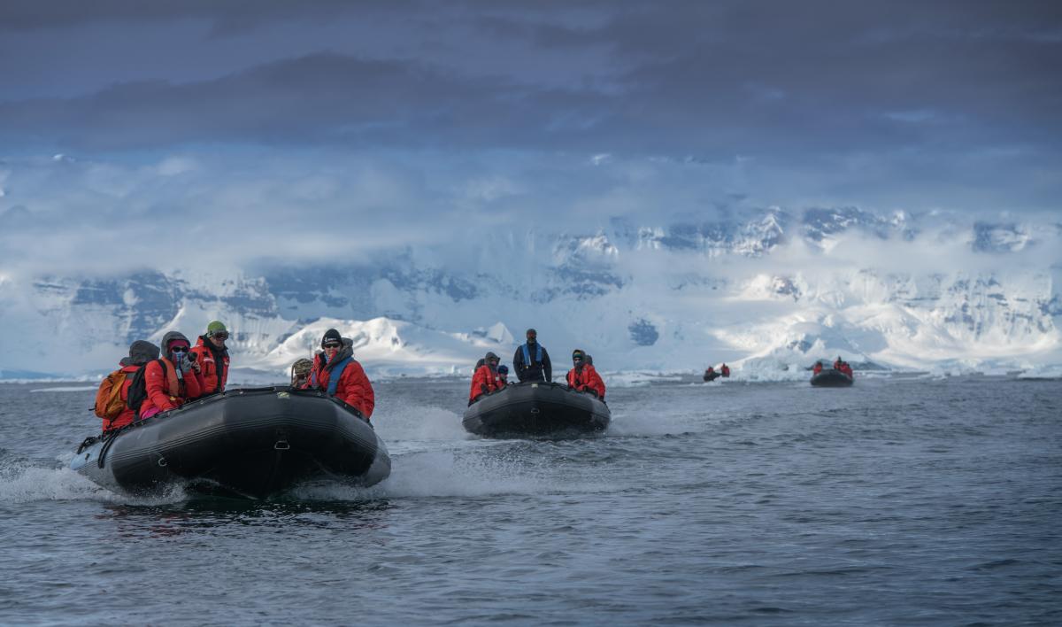 women in boats in Antarctica