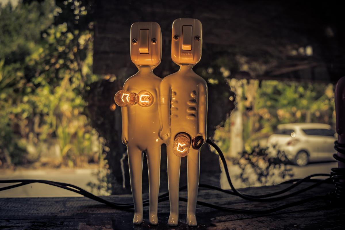 Power switches in the shape of a man and woman's body