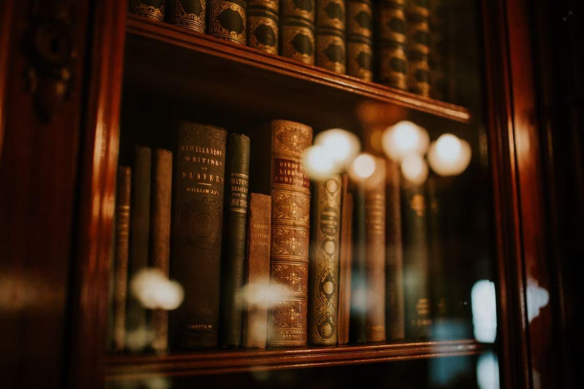 books in a cabinet 