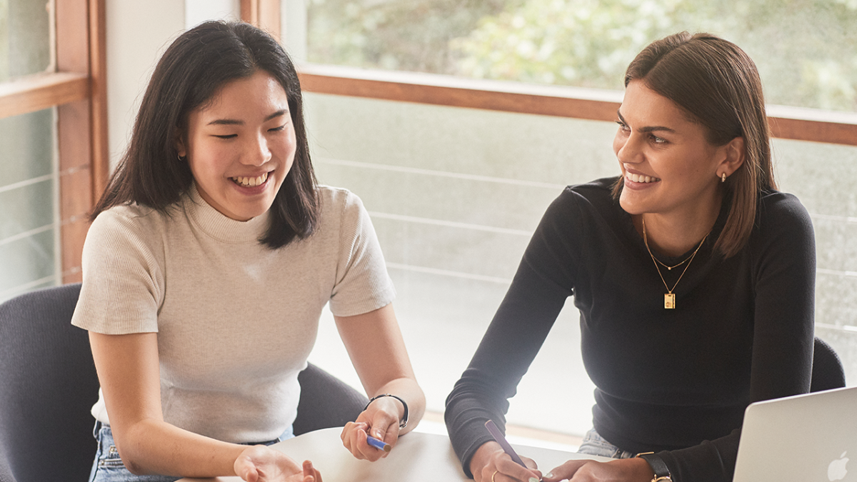 Image of two women in discussion