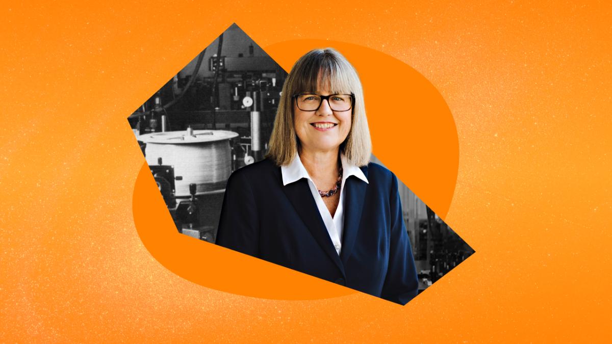 Image of Donna Strickland with a lab behind her